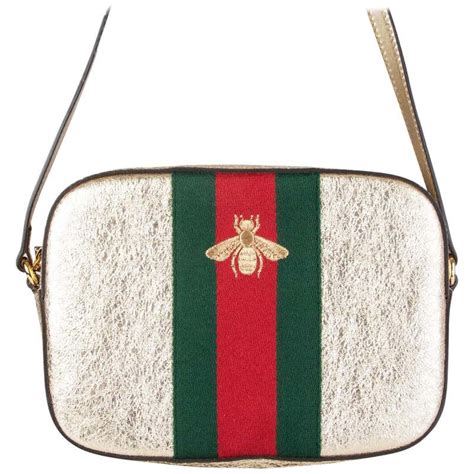 gucci gold bee bag|Altro.